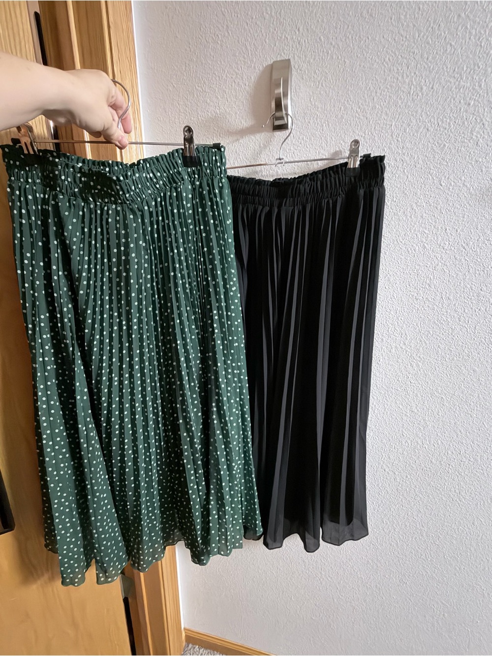 two stylish pleated skirts